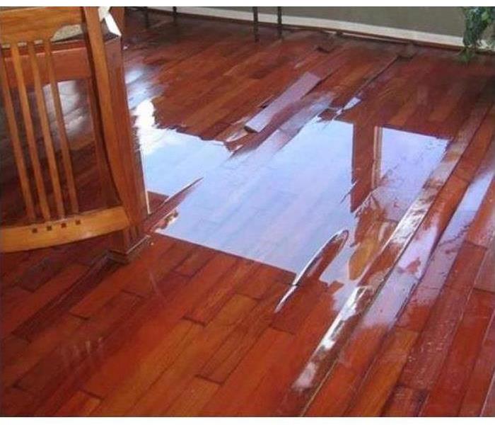 Flooded/ warped wood floors